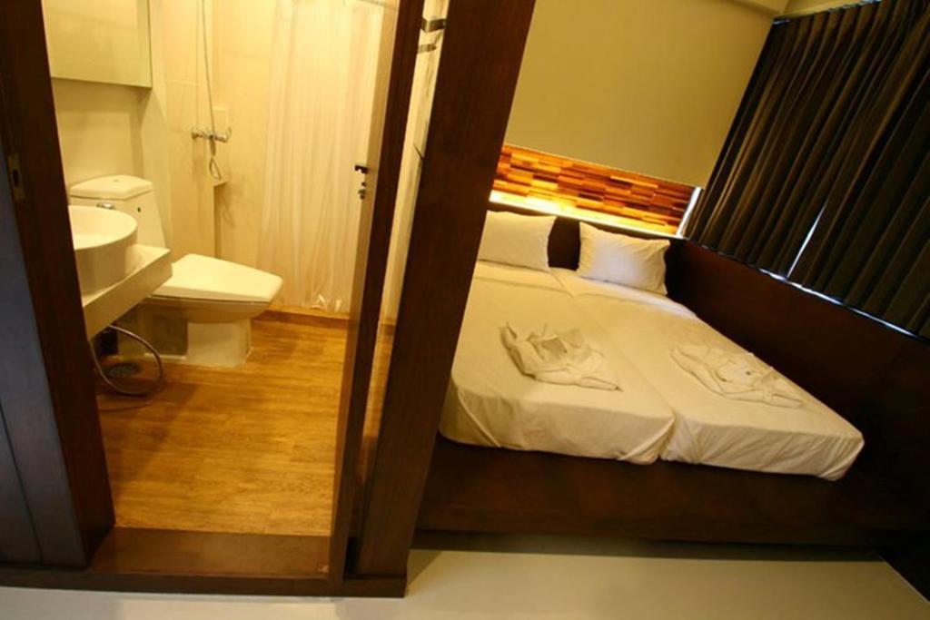 At One Inn Hualampong Bangkok Værelse billede